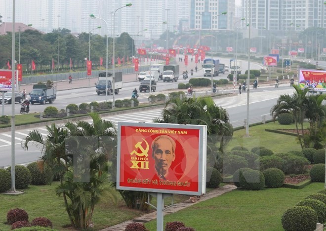 Domestic newspapers feature Vietnam’s 12th National Party Congress - ảnh 1